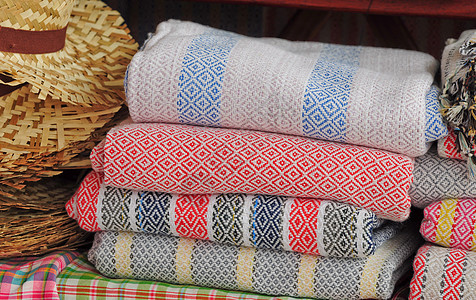 泰国传统东南小岛的有色纺织业 泰国衣服材料文化格子正方形零售绣花毯子裙子织物图片