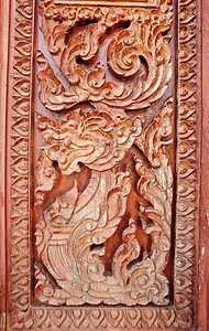 泰国庙门雕刻框架木工木材寺庙艺术风格手指装饰手工业雕塑图片