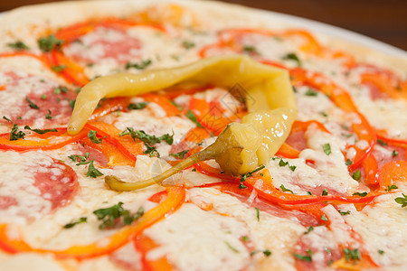 披萨和胡椒午餐面团脆皮育肥馅饼喜悦蔬菜小吃洋葱香肠图片