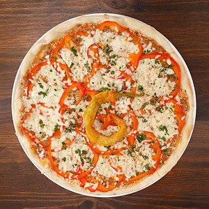 披萨和胡椒辣椒喜悦面团午餐平底锅美食脆皮食物洋葱育肥图片