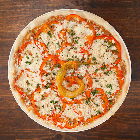 披萨和胡椒辣椒喜悦面团午餐平底锅美食脆皮食物洋葱育肥图片