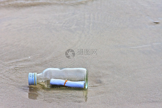 海滩上的玻璃瓶创造力笔记瓶子海洋孤独镜像邮件帮助水平抛弃图片