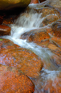 水瀑游客蓝色自由石头假期胜利旅行国家高度生态图片