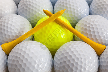 高尔夫球和金球发球台运动静物背景图片