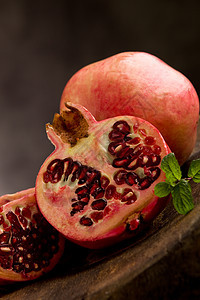 艺术风格差的石榴异国豆子静物照片热带情调健康水果食物红色图片