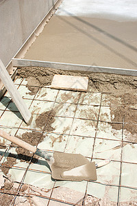 建造两地建筑工人水泥平板工作工地户外工人装修作品砌体砂浆图片