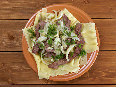 贝什巴马香料牛肉洋葱盘子面条餐厅文化羊肉用餐美食图片