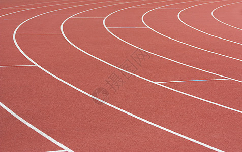 运动员赛道曲线车道红色跑步场地运动背景图片