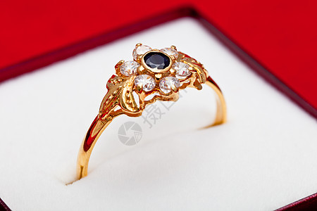 黑白和蓝色圆环金戒指礼物宏观金属金子宝石奢华反射圆圈珠宝图片