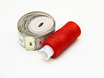 红线与厘米的圆圈刺绣针织卷轴绳索橙子纤维玫瑰缠绕腹部裁缝图片