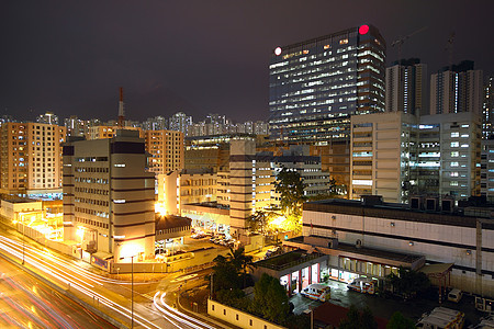 市区市区夜间交通住宅市中心天际街道广告牌商业风暴建筑汽车图片