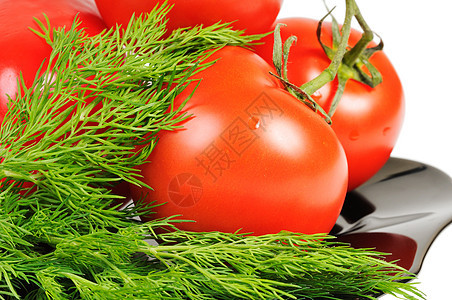 黑色盘子上的番茄红色生活方式烹饪健康饮食西红柿蔬菜素食图片