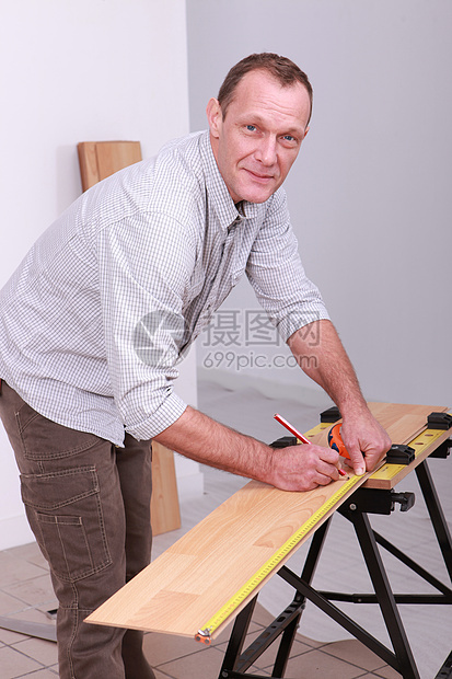 木匠的标识木材安装角落建造木头划痕男人劳动铅笔统治者磁带图片
