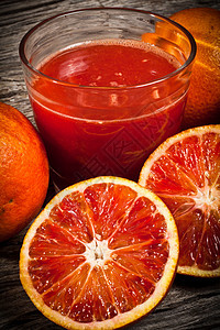 橙色塔罗肉质橙子果汁饮料玻璃橙汁水果木头塔罗牌营养图片