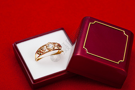 带白圆环的金戒指反射珠宝宝石奢华宏观金属礼物圆圈戒指金子图片