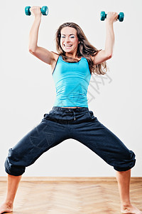 体育锻练杂技行动姿势瑜伽训练服活动女性成人哑铃体操图片