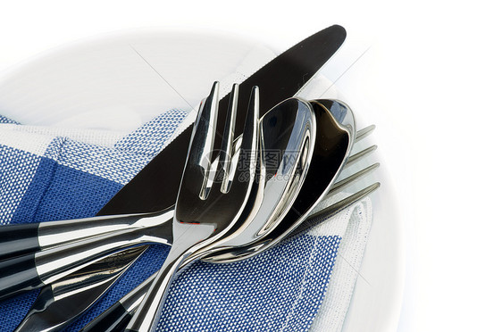 银器曲线宏观不锈钢蓝色勺子餐刀餐具餐巾用具厨房图片