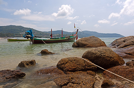 船只和岩石木材运输照片自然海景海岸线旅行天空图片