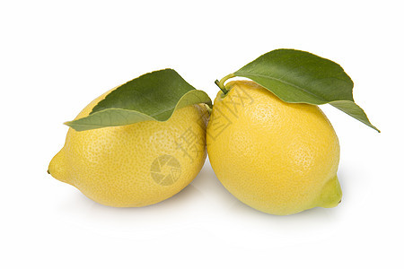 含叶子的柠檬白色饮食蔬菜树叶黄色绿色果汁水果静物营养图片