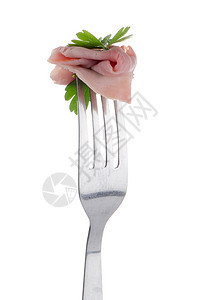火腿的切片在叉子上被割断饮食小吃粉色生物倾斜白色熏制猪肉图片