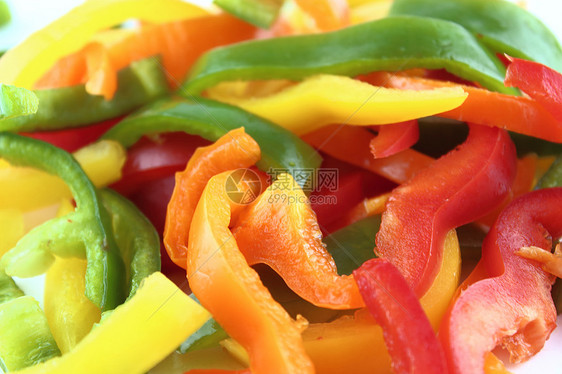 色彩多彩的甜甜胡椒片橙子烹饪蔬菜保健卫生胡椒辣椒食物美食营养图片