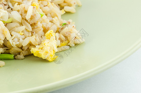 炒米饭黄色油炸蔬菜食物盘子午餐餐厅背景图片