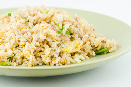 炒米饭油炸黄色盘子蔬菜食物餐厅午餐背景图片
