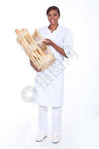 带一篮面包的布朗特女人裙子面包师展示白色贸易长袍篮子工作伴侣教学图片