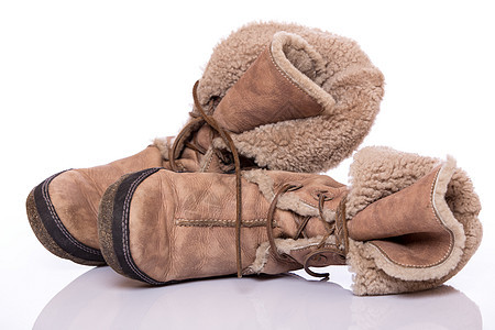 冬季鞋子季节皮革生态毛皮蕾丝棕色白色季节性图片