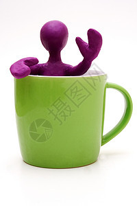 杯中装饰的塑胶紫色木偶图片