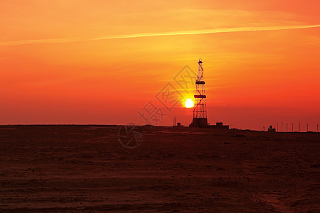 太阳下山工程石油摄影橙子燃料钻机草原工具日落钻头图片