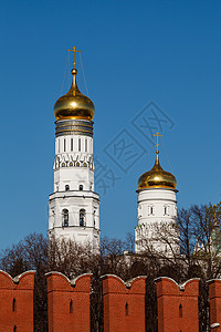 俄国莫斯科克里姆林宫墙后面的伊凡大钟塔金子寺庙圆顶大教堂纪念碑正方形文化景观教堂天空图片
