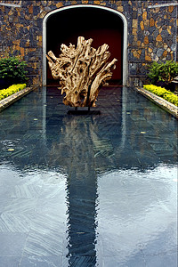 抽象雕塑切口金属曲线纪念碑衬套萝卜植物花园扭力制品艺术图片