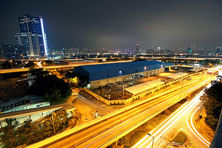 现代城市的夜间辉光运输赛车场景市中心车辆驾驶过境立交桥路灯图片