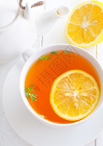 白杯里加柠檬的清茶香气竹子刺激芳香飞碟百里香兴奋剂早餐液体黏土图片