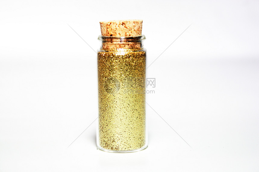 玻璃小瓶中金色闪光粉图片