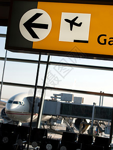 机场终点站商用飞机椅子袖子旅行装载运输飞机外观反射地点背景图片