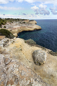 阿尔加尔夫自然海岸线蓝色海岸假期场景岩石植被支撑旅行悬崖洞穴图片