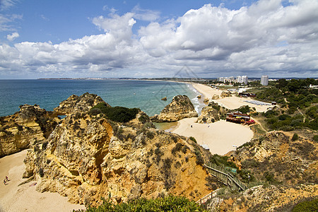 极好葡萄牙海滩假期波浪黄色多云海岸线风景商业海洋海岸支撑图片
