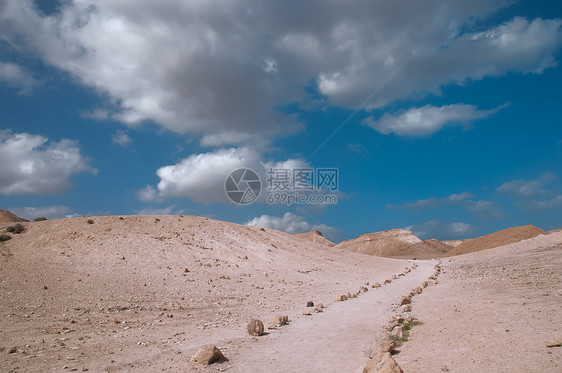 荒漠道路景观沙漠蓝色荒野峡谷天空旅游天气风景地平线石头图片