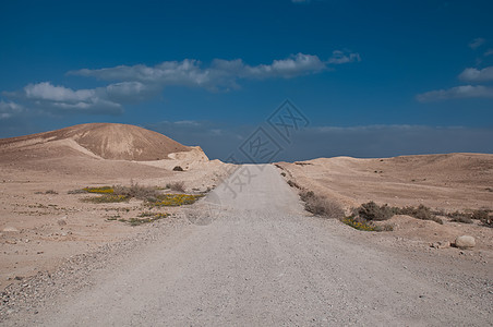 荒漠道路景观地平线蓝色沙漠天空旅游风景荒野石头峡谷天气图片