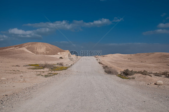 荒漠道路景观地平线蓝色沙漠天空旅游风景荒野石头峡谷天气图片