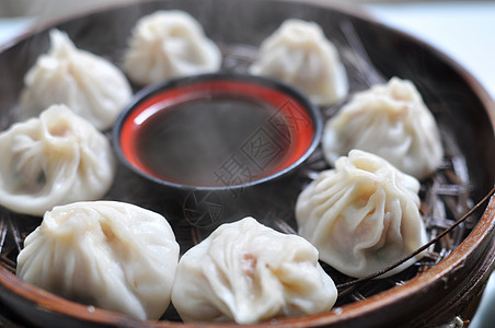 蒸汽午餐盘子面团餐厅烹饪饺子大豆早餐竹子猪肉图片