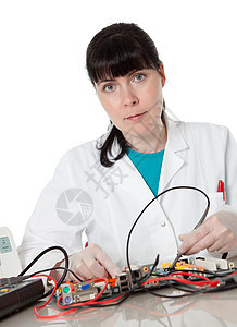 女性辅助计算机工程师信息技术女修补缺陷电脑实验室技术员办公室维修专家硬盘红发外套故障图片
