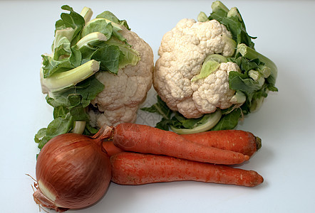 菜花卷心菜 胡萝卜和洋葱图片