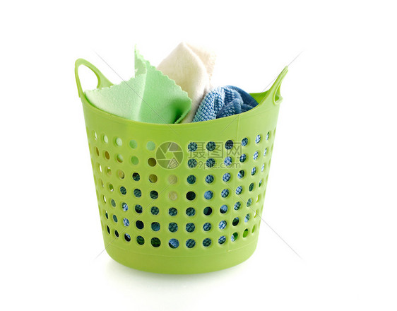 以绿色塑料篮形布织的绿色塑料板 在白色上隔绝服装折痕家务洗衣店家庭毯子衣服纺织品织物洗涤图片