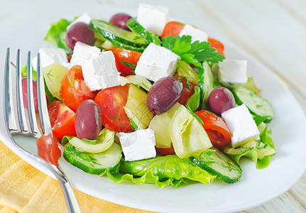 希腊沙拉洋葱胡椒草药黄瓜维生素营养迷迭香美食蔬菜餐巾图片