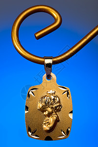 黄金寄件者装饰品项链吊坠金属宝石金子婴儿珠宝配饰宏观背景图片