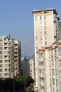 中国居民居住权之四紫色建筑物天空场景空气首都植物房子阳台居住图片