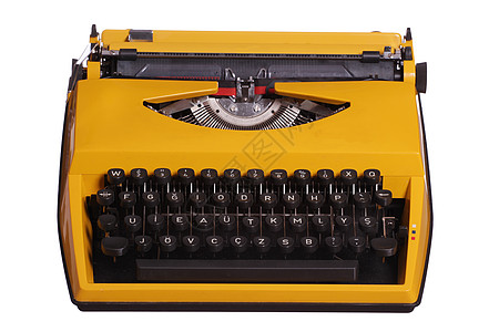 旧黄色打字机图片